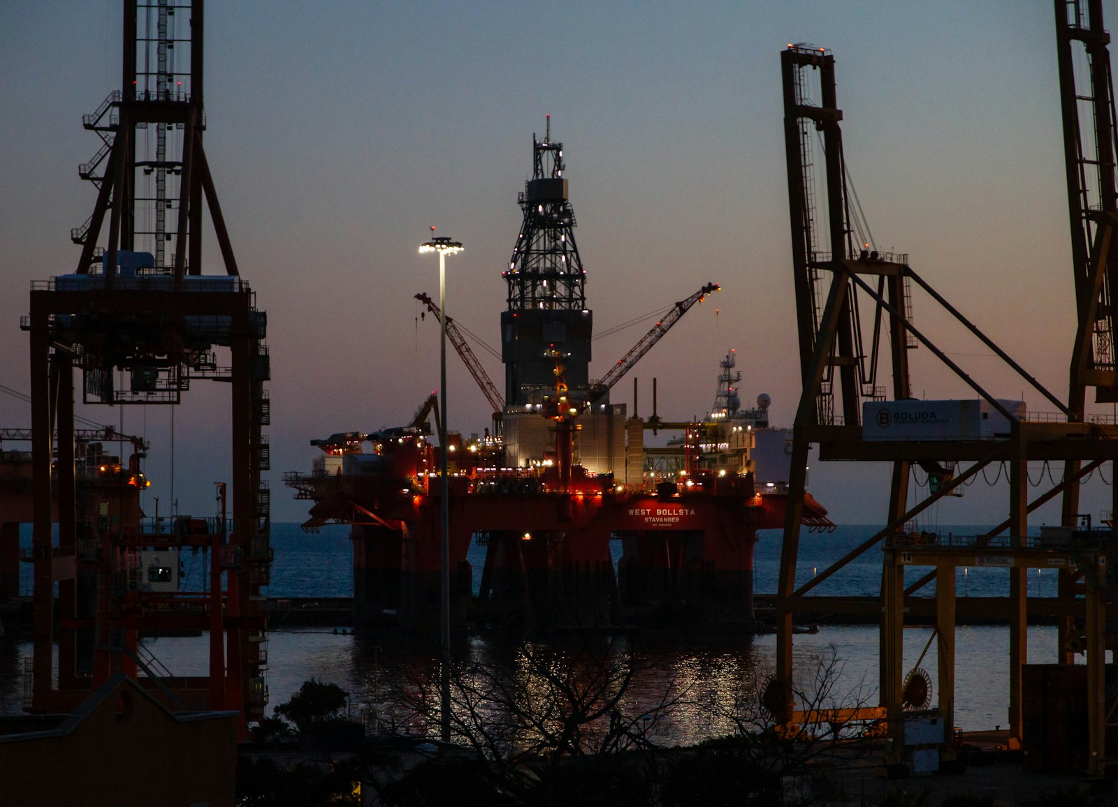 Working harbour and marine infrastructure at dusk